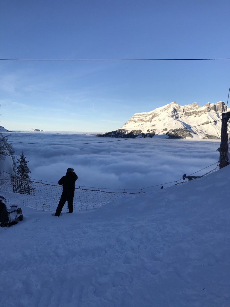 mountain views above clouds